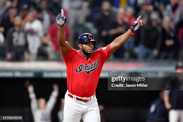 Yasiel Puig of the Cleveland Indians celebrates after hitting a walk-off RBI single to deep right during the tenth inning against the Detroit Tigers...