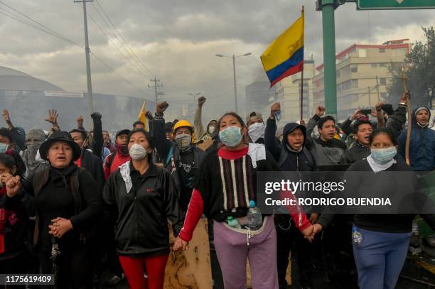 Demonstrators protest outside the Casa de la Cultura in Quito on October 13 as indigenous leaders preparedto meet President Lenin Moreno for...