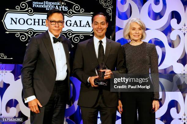 Co-Founders Felix Sanchez and Merel Julia present an award to Former U.S. Secretary of Housing and Urban Development Julian Castro at the National...