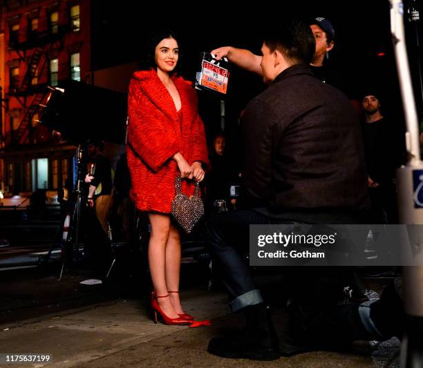Lucy Hale and Zane Holtz on location for 'Katy Keene' in a scene where Holtz's character gets robbed of the engagement ring as he is proposing to...