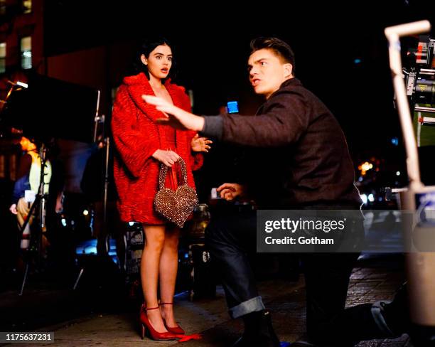 Lucy Hale and Zane Holtz on location for 'Katy Keene' in a scene where Holtz's character gets robbed of the engagement ring as he is proposing to...