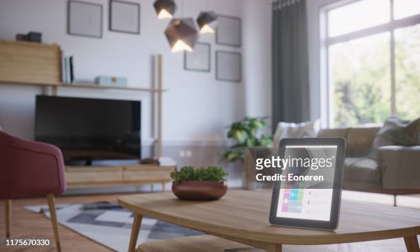 smart home control in scandinavian home interior - smart stock pictures, royalty-free photos & images