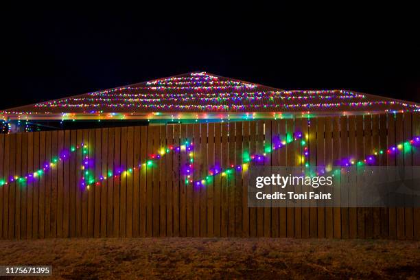 christmas lights on display - fences 2016 film stock-fotos und bilder