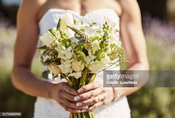 ready to enter into commitment - bride holding bouquet stock pictures, royalty-free photos & images