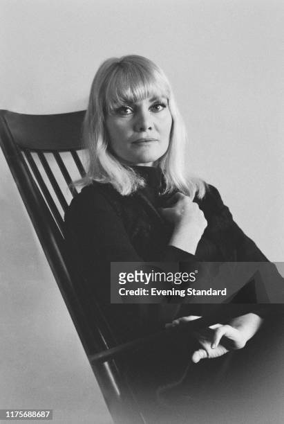 Australian actress Diane Cilento seated in a chair on 11th May 1970.