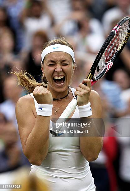 Sabine Lisicki of Germany celebrates after winning her quarterfinal round match against Marion Bartoli of France on Day Eight of the Wimbledon Lawn...