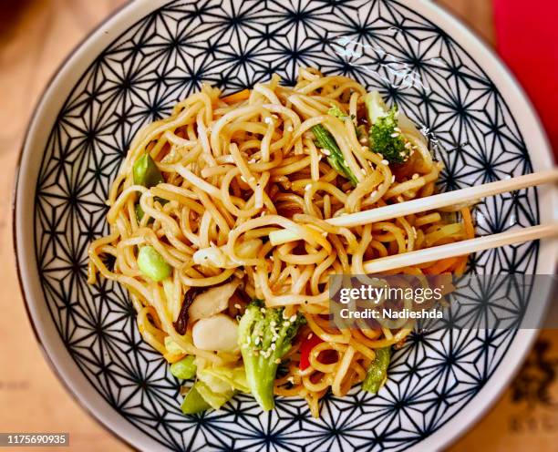 vegetarian yakisoba - stir frying european stock pictures, royalty-free photos & images