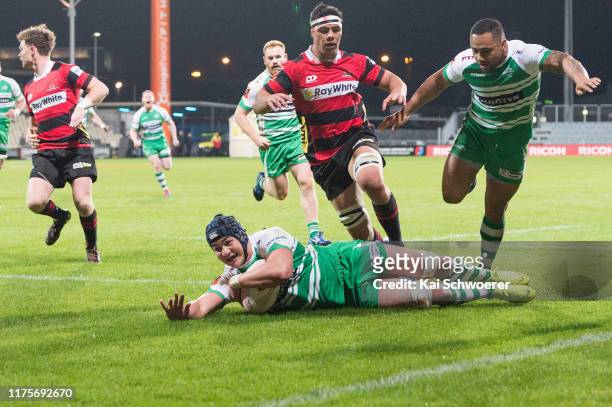Brayden Iose of Manawatu dives over to score a try during the round 7 Mitre 10 Cup match between Canterbury and Manawatu at Orangetheory Stadium on...