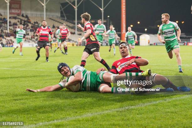 Brayden Iose of Manawatu dives over to score a try during the round 7 Mitre 10 Cup match between Canterbury and Manawatu at Orangetheory Stadium on...