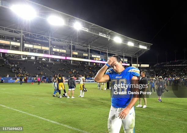 Hunter Henry of the Los Angeles Chargers walks off the field after a 24-17 loss to the Pittsburgh Steelers at Dignity Health Sports Park October 13,...