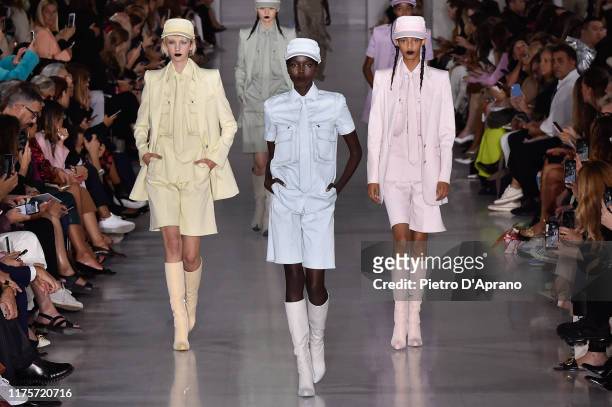 Bente Oort, Ajok Madel and Mona Tougaard walk the runway at the Max Mara show during Milan Fashion Week Spring/Summer 2020 on September 19, 2019 in...