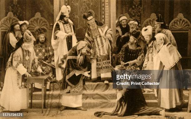 Judas before the Sanhedrin, 1922. The traitor Judas is tried before an assembly of rabbis: players in the Oberammergau Passion Play. The play is...