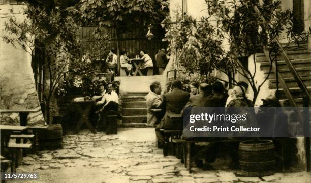 Winery at Grinzing, Vienna, Austria, circa 1935. The district of Grinzing is famous for its vineyards and numerous 'Heurigen'. Traditional cafes...