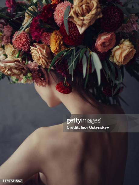 young naked woman wearing floral headdress - skinny rib stock pictures, royalty-free photos & images
