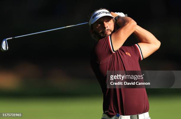 Joost Luiten of the Netherlands plays his second shot on the 9th hole during Day One of the BMW PGA Championship at Wentworth Golf Club on September...