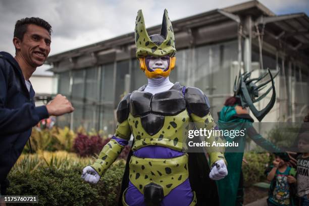 Costumed fan poses inside the Chamber of Commerce of Bogota on SOFÁ on October 13, 2019 in Bogota, Colombia