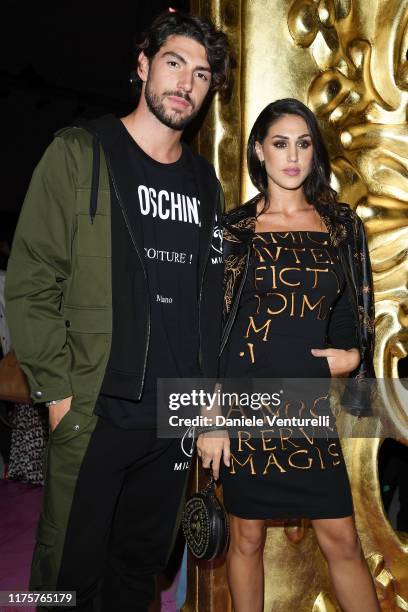 Ignazio Moser and Cecilia Rodriguez attends the Moschino fashion show during the Milan Fashion Week Spring/Summer 2020 on September 19, 2019 in...