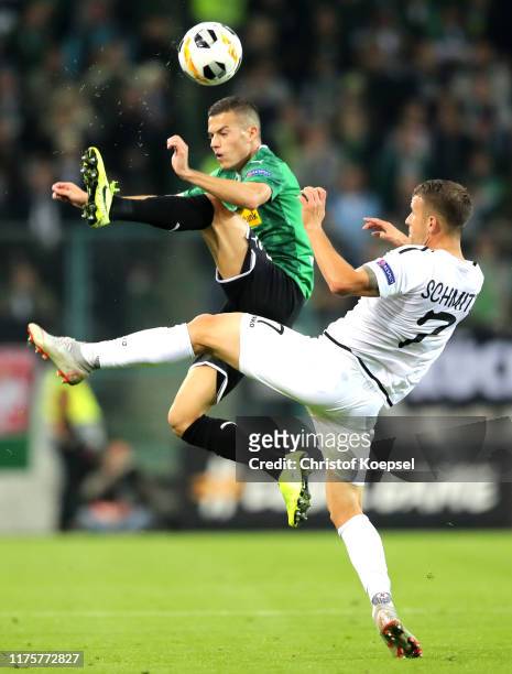 Laszlo Benes of Borussia Monchengladbach is challenged by Lukas Schmitz of Wolfsberger AC during the UEFA Europa League group J match between...