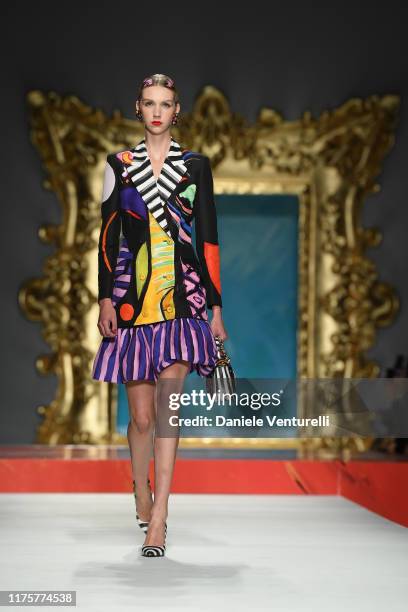 Model walks the runway at the Moschino show during the Milan Fashion Week Spring/Summer 2020 on September 19, 2019 in Milan, Italy.