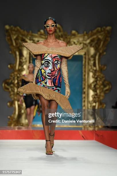 Model walks the runway at the Moschino show during the Milan Fashion Week Spring/Summer 2020 on September 19, 2019 in Milan, Italy.