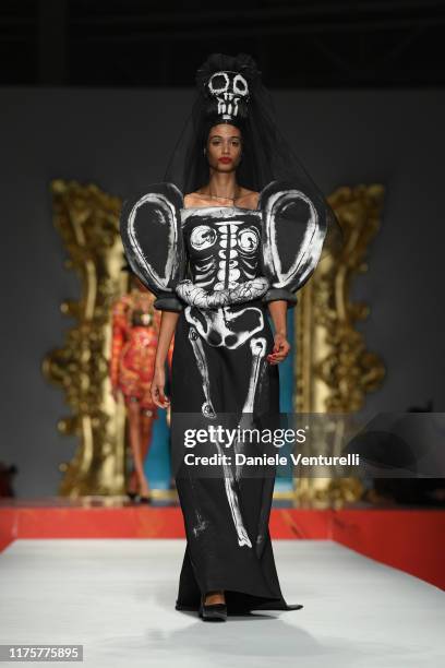 Model walks the runway at the Moschino show during the Milan Fashion Week Spring/Summer 2020 on September 19, 2019 in Milan, Italy.