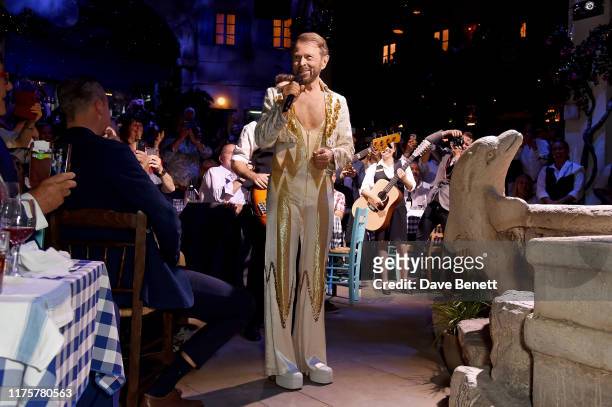 Bjorn Ulvaeus makes a cameo in his original ABBA costume from 1977 at the opening night of MAMMA MIA! The Party at The O2 on September 19, 2019 in...
