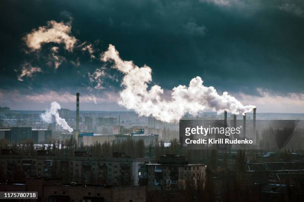 power plant in winter - air pollution stock pictures, royalty-free photos & images