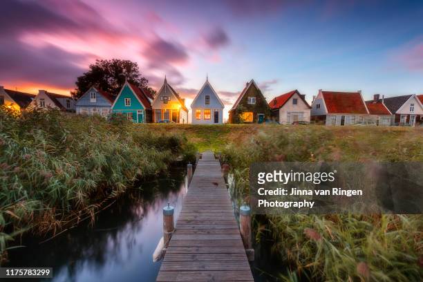 sunset at durgerdam historical town - netherlands stock-fotos und bilder