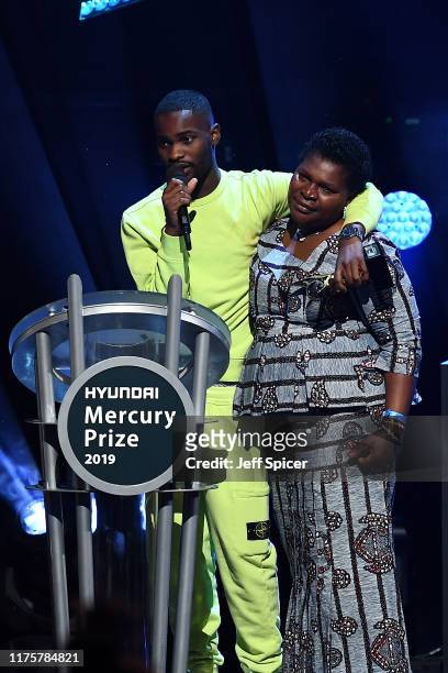 Winner rapper Dave speaks on stage with his mum after receiving the Hyundai Mercury Prize: Albums of the Year Award at Eventim Apollo, Hammersmith on...