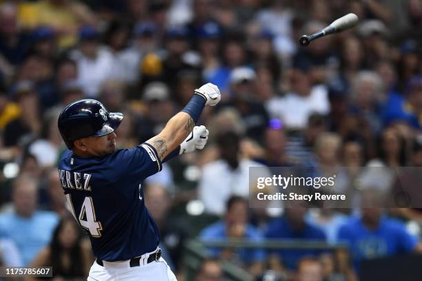 Hernan Perez of the Milwaukee Brewers loses his bat during the third inning against the San Diego Padres at Miller Park on September 19, 2019 in...