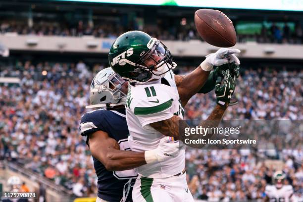 Dallas Cowboys Cornerbacker Byron Jones breaks up a pass intended for New York Jets Wide Receiver Robby Anderson during the first half of the game...