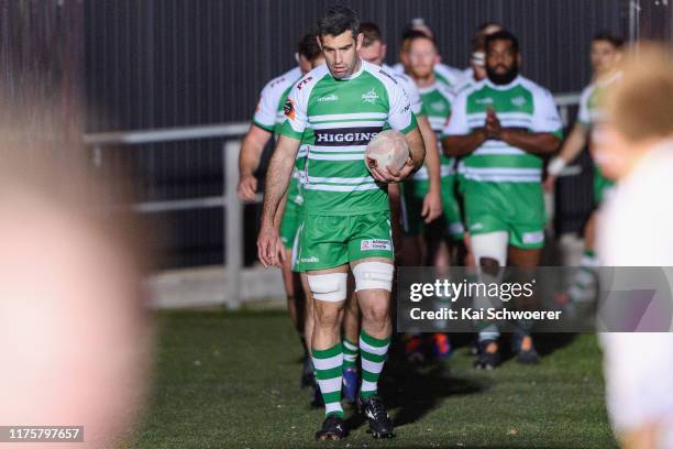 Nick Crosswell of Manawatu leads his team onto the field for his 100th Mitre 10 Cup match during the round 7 Mitre 10 Cup match between Canterbury...