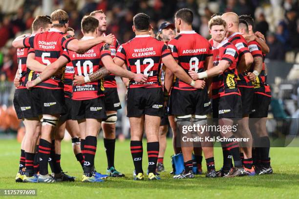 Captain Mitchell Drummond of Canterbury and his team mates huddle during the round 7 Mitre 10 Cup match between Canterbury and Manawatu at...