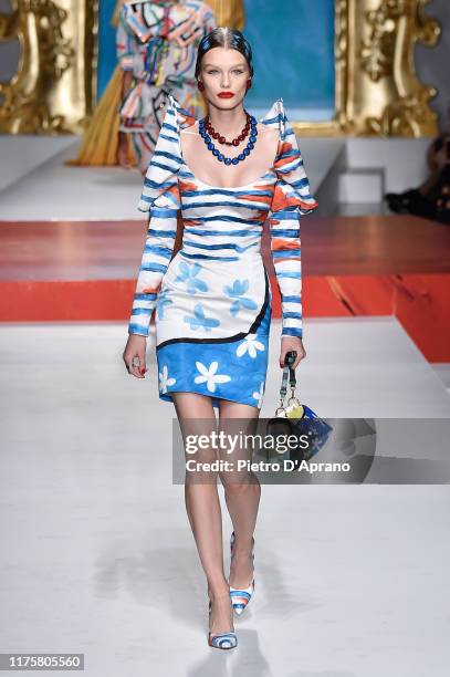 Kris Grikaite walks the runway at the Moschino show during the Milan Fashion Week Spring/Summer 2020 on September 19, 2019 in Milan, Italy.