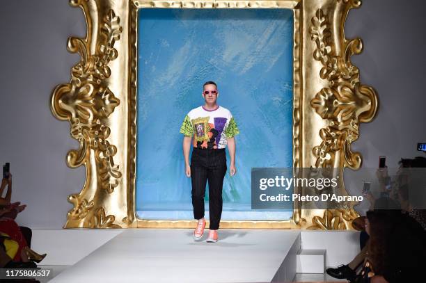 Jeremy Scott walks the runway at the end of the Moschino show during the Milan Fashion Week Spring/Summer 2020 on September 19, 2019 in Milan, Italy.