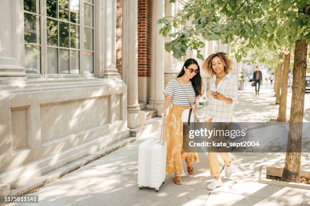 young woman going to vacation - toronto summer stock pictures, royalty-free photos & images