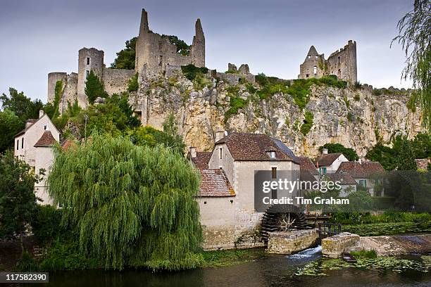 Traditional French houses and Chateau Guichard ruins at Angles Sur L'Anglin medieval village, Vienne, near Poitiers, France