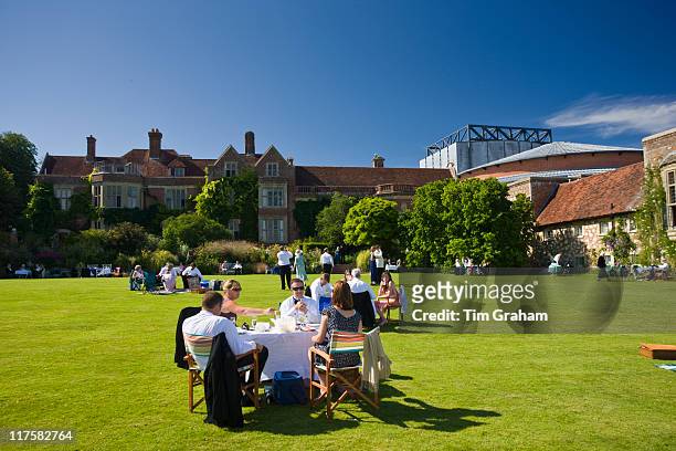 Opera-lovers attend annual Glyndebourne Opera Festival and picnic in the grounds, Glyndebourne, East Sussex, UK