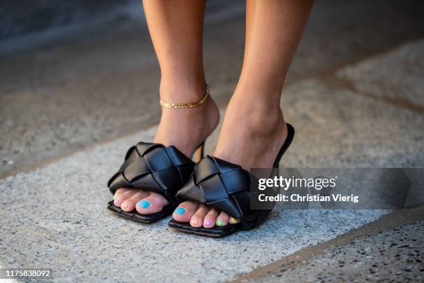 Tiffany Hsu seen with multi colored nails wearing LIDO -PS20 Bottega Veneta shoes outside Attico during Milan Fashion Week Spring/Summer 2020 on...