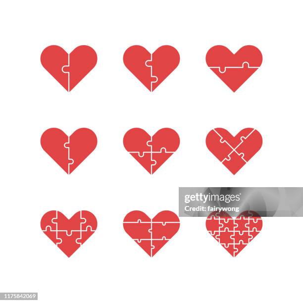 herzförmige puzzle-symbole - puzzle stock-grafiken, -clipart, -cartoons und -symbole