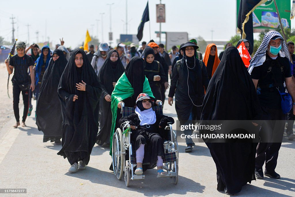 Muslims In Iraq Shiite Muslim pilgrims pass through the holy Iraqi city of Najaf on ...