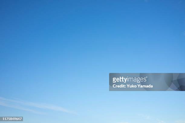 clouds typologies - morning - blue sky clouds stock-fotos und bilder