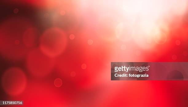 defocused lights background - shiny red stock pictures, royalty-free photos & images