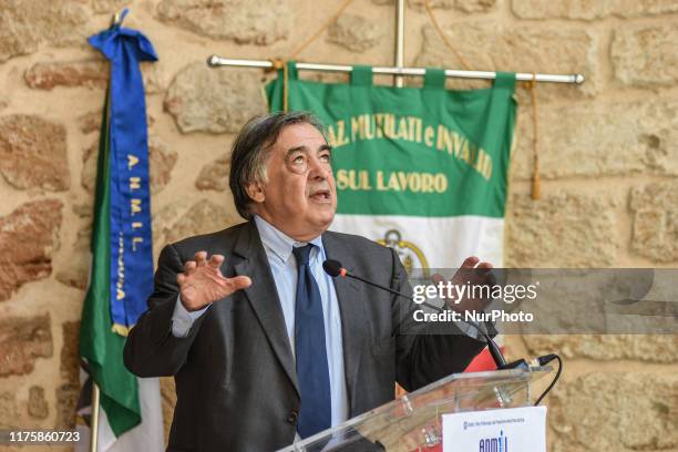 The mayor of Palermo Leoluca Orlando speaks during the 69th National ANMIL Day, for victims of accidents at work, was celebrated at the Complex of...