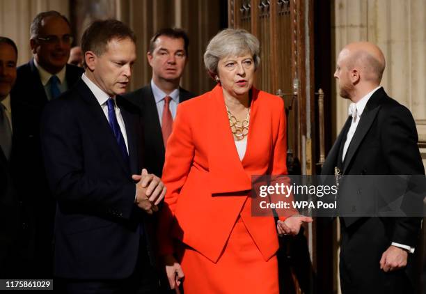 Former Prime Minister Theresa May walks through the Commons Members Lobby during the State Opening of Parliament at the Palace of Westminster on...