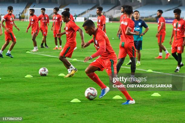 Bangladesh's national football team captain Jamal Bhuyan takes part in a training session with teammates ahead of their World Cup 2022 and 2023 AFC...