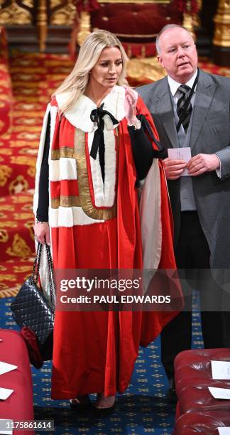 Baroness Michelle Mone takes her seat in House of Lords to listen to the Queen's Speech during the State Opening of Parliament in the Houses of...