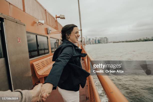 familj i en färja i new york city - staten island ferry bildbanksfoton och bilder