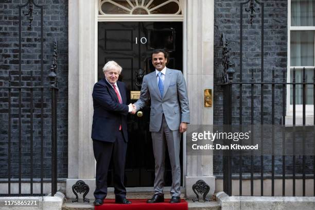 British Prime Minister Boris Johnson welcomes the Emir of Qatar, Sheikh Tamim bin Hamad al-Thanito at 10 Downing Street on September 20, 2019 in...