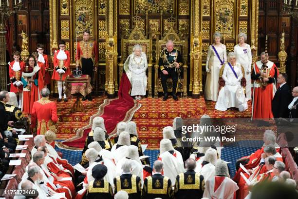 Queen Elizabeth II and Prince Charles, Prince of Wales during the State Opening of Parliament at the Palace of Westminster on October 14, 2019 in...